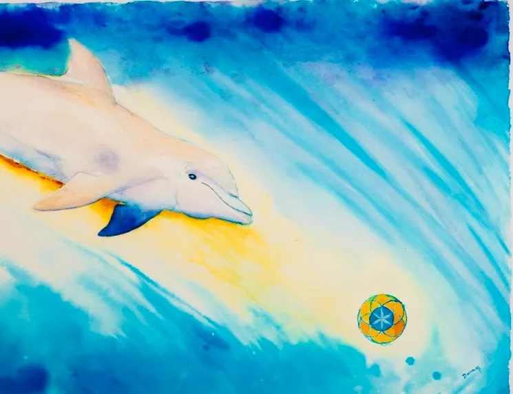 Dolphin swimming with flower of life glowing ball