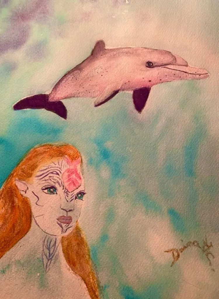 Dolphin swimming above ethereal woman
